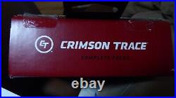 Crimson Trace CMR-206 Rail Master Laser Sight Green. Box opened for photographs